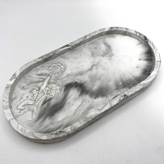 Ovale Marmorschale mit Blumenrelief